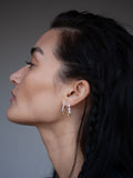 Standard Friendship Safety Pin Earring pictured in models ear. 