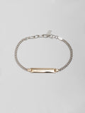 Mini Watts ID Necklace pictured on light grey background.