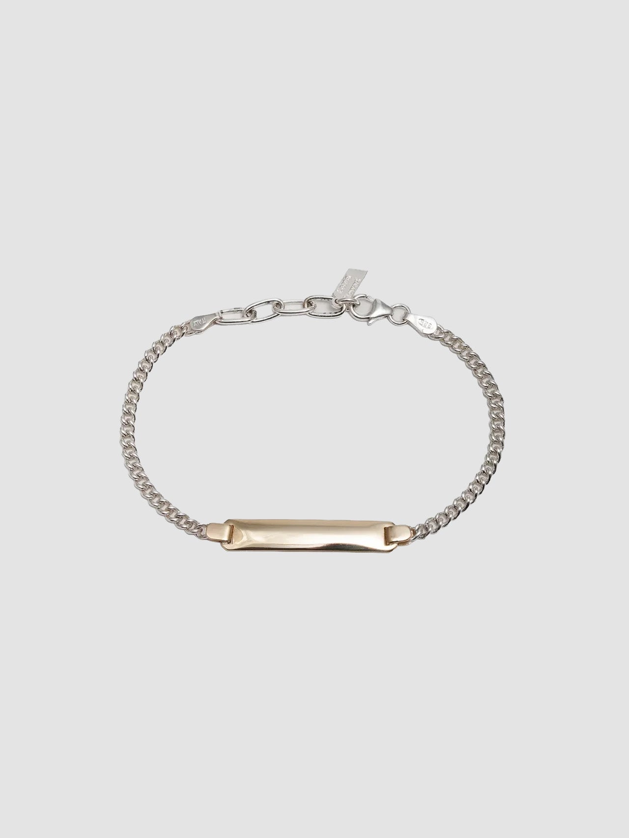 Mini Watts ID Necklace pictured on light grey background.
