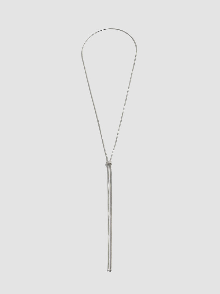 Bolo Pendant Necklace pictured on light grey background.