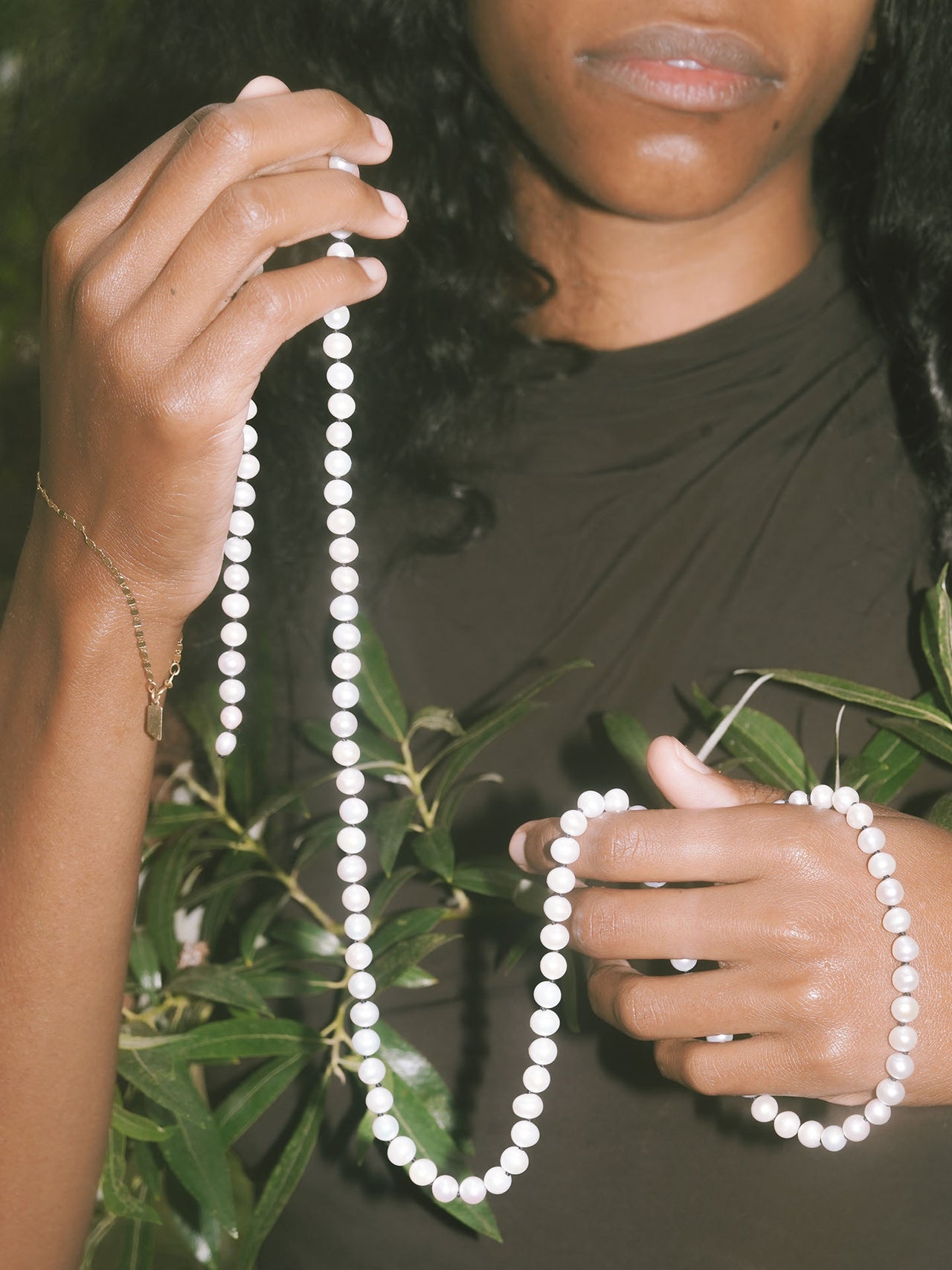 14kt Yellow Gold Pearl Freshwater Pearl Necklace or Bodychain pictured being held in models hands