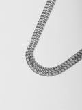 Close up of Sterling Silver Lightweight Mesh Chain Necklace on light grey background. 