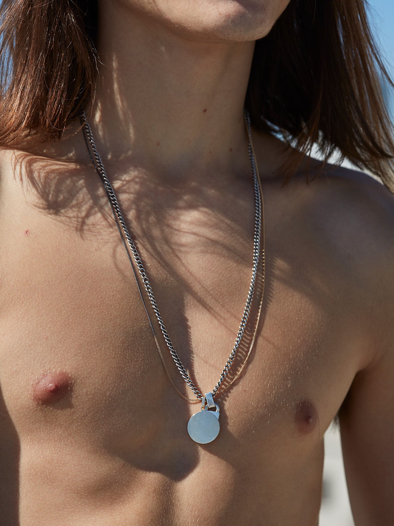 Sterling Silver Disk Pendant pictured on model.