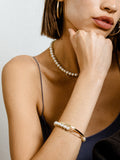 14kt Yellow Gold Safety Pin & Pearl Bracelet  pictured on model.