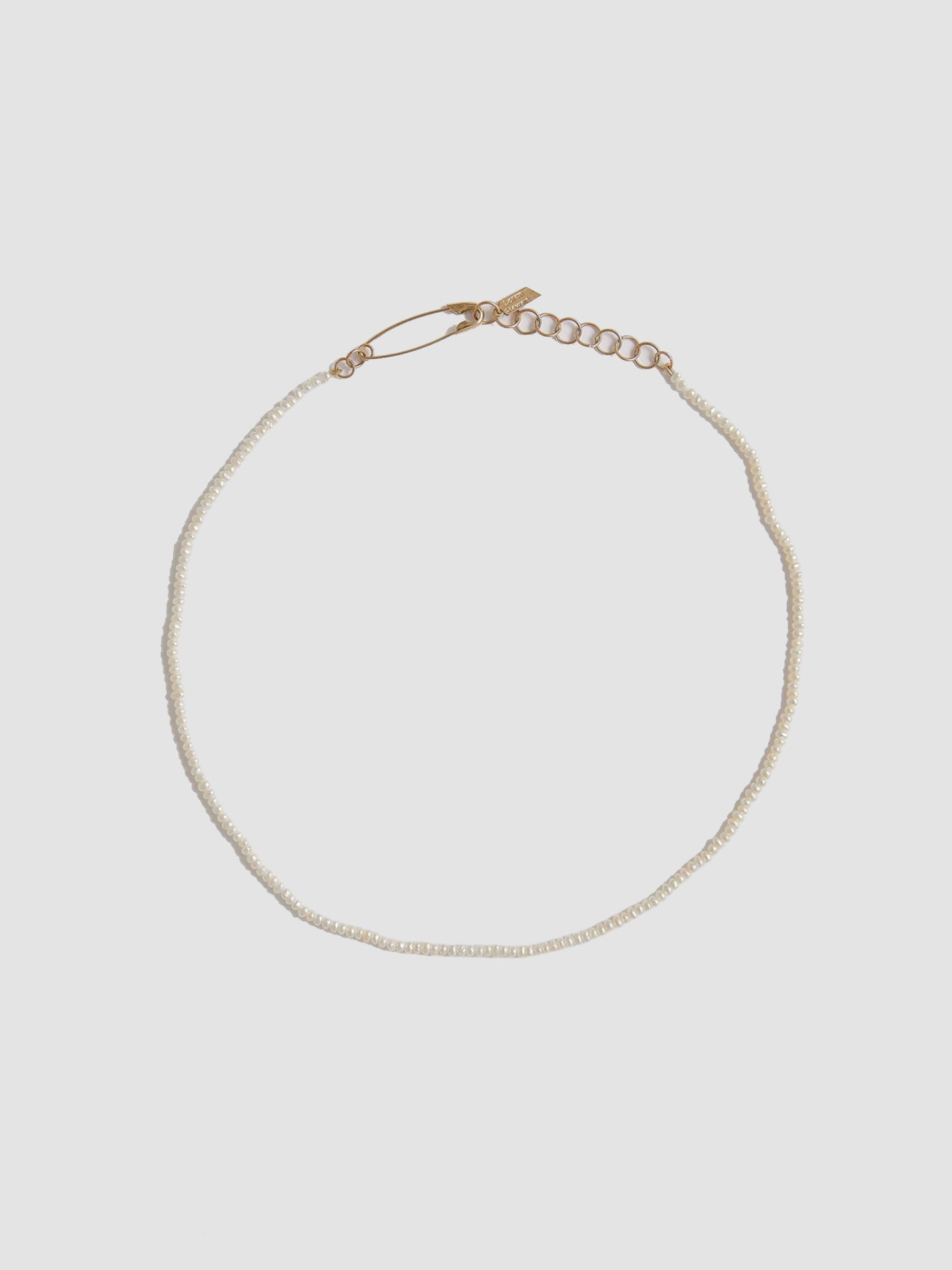 2.5mm Freshwater Pearls with 14Kt Yellow Gold Safety Pin Closure