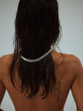 Sterling Silver Flat Curb Chain pictured on model. light grey background. 