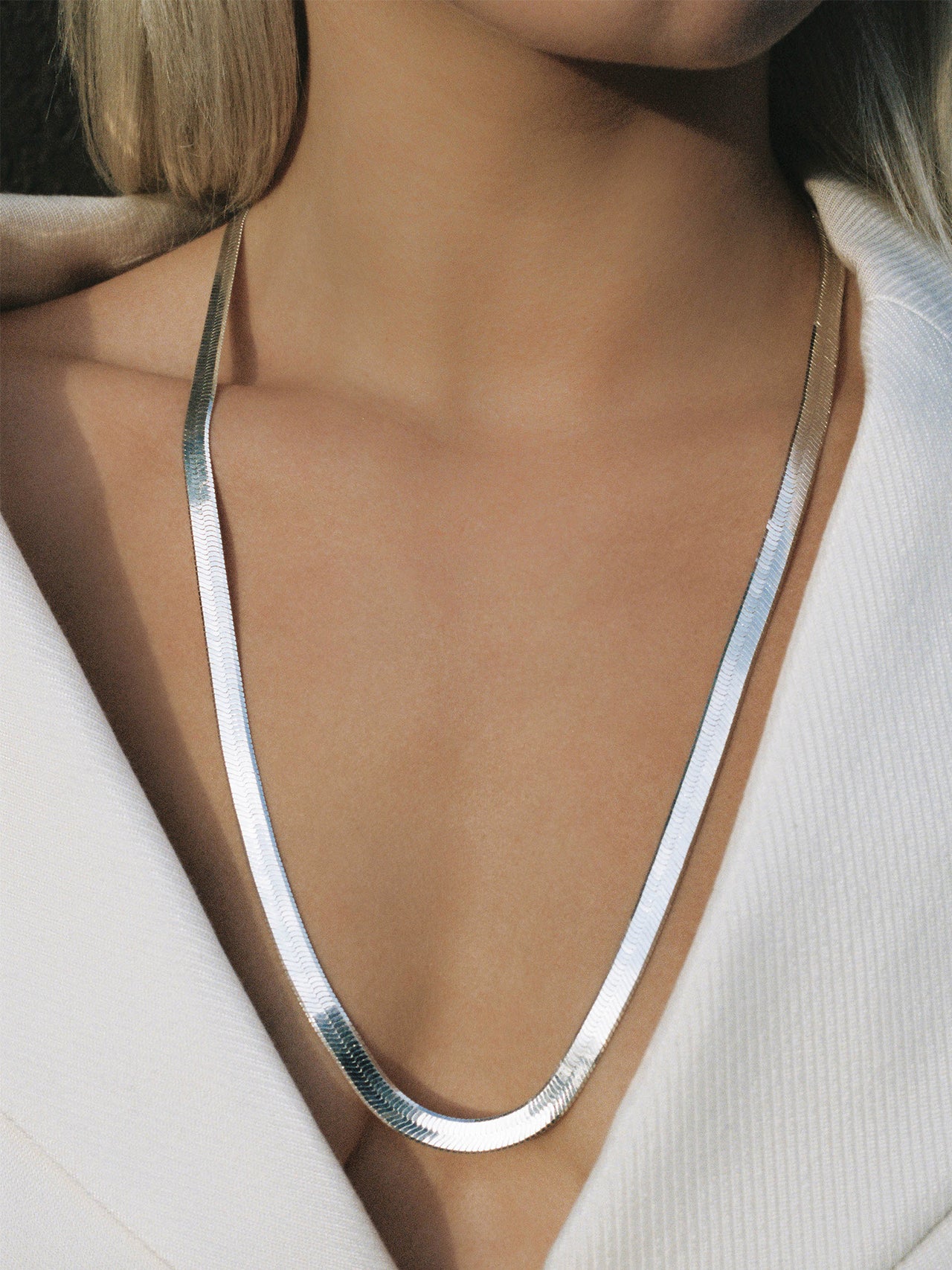 Ultra Sterling Silver Herringbone Necklace pictured on model.