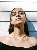 14kt Yellow Gold Pearl & Gemstone Necklace pictured on model. 