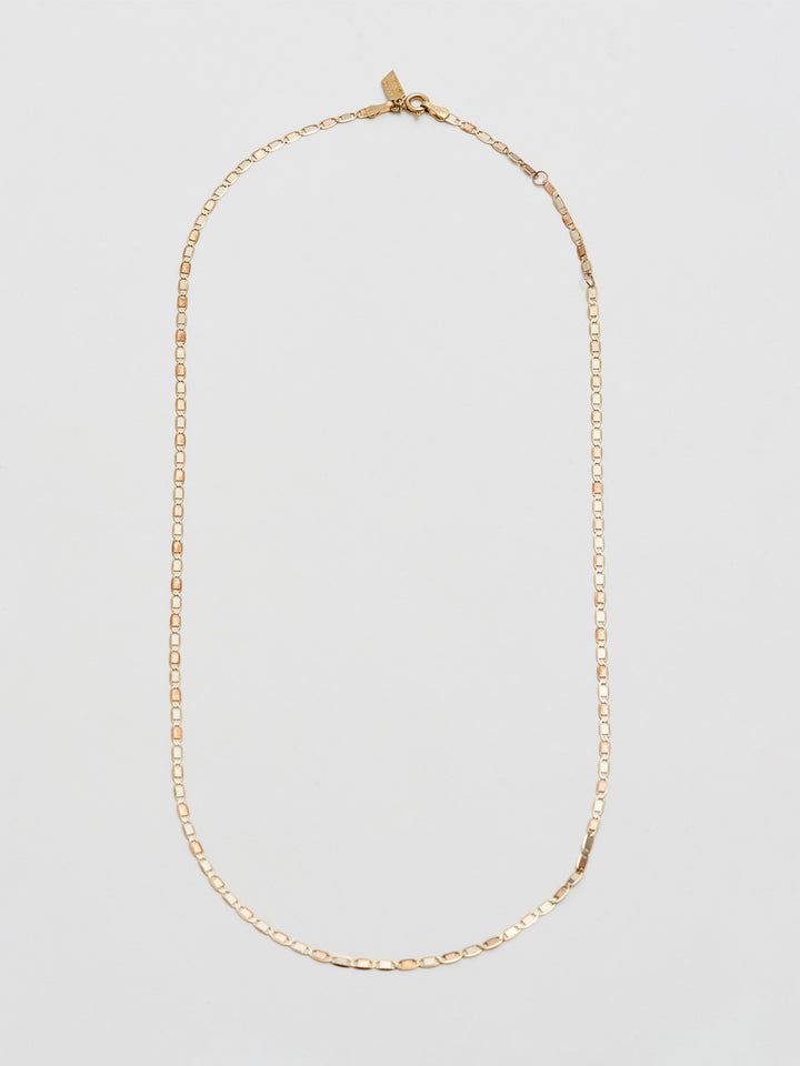 10Kt Italian Tri-Colored Yellow, Rose, and White Gold Chain pictured on light grey background