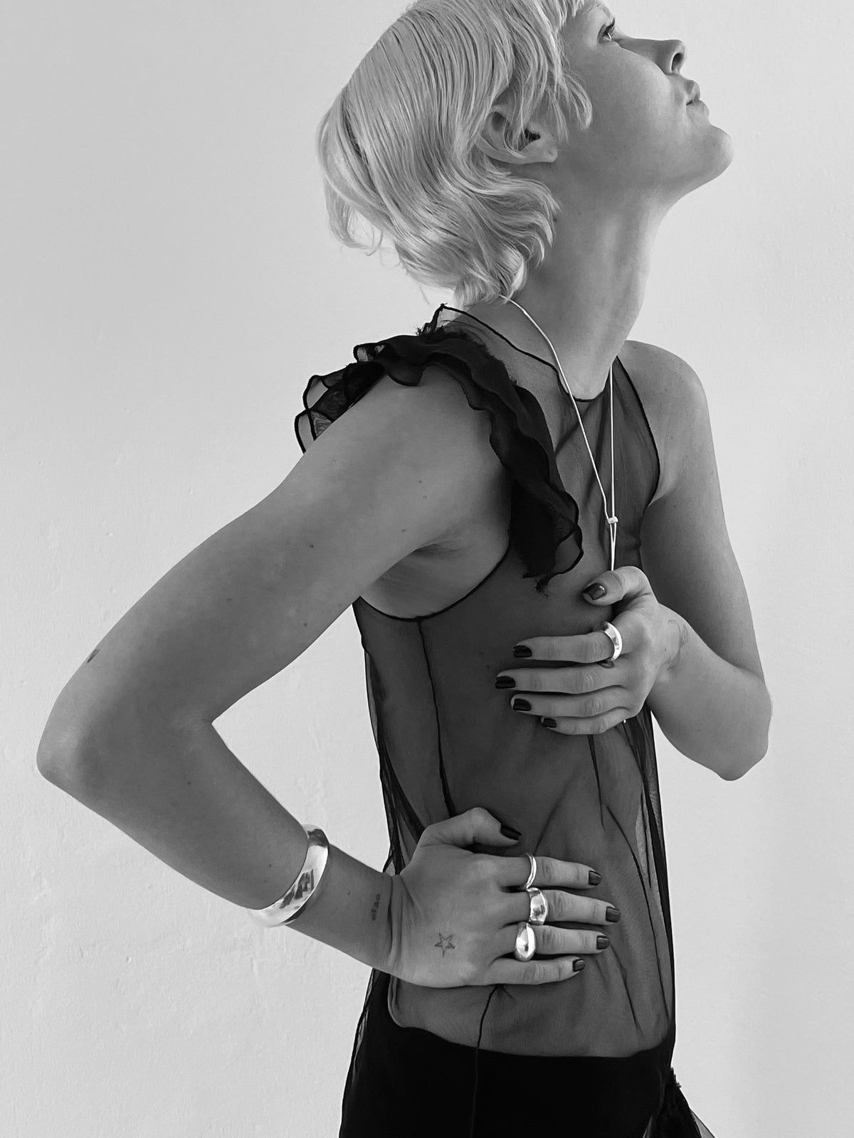 Sterling Silver Bolo Pendant Necklace pictured on model. 