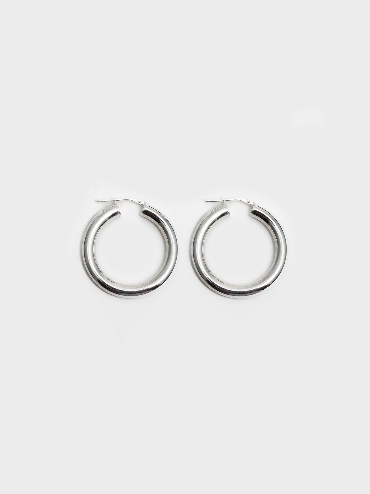 Product image of thick sterling silver Tru Hoop earrings.