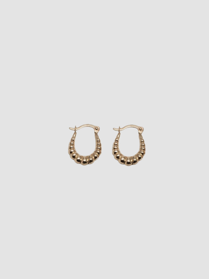 Product image of yellow gold bolla hoops shot on white background.