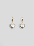 14kt Yellow Gold Click-On Huggies with Silver Heart pendant pictured on light grey background.