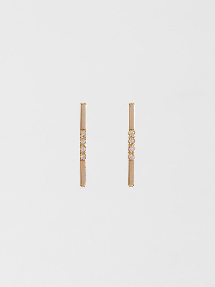 14kt Yellow Gold Diamond Rod Stud Earring pictured as pair on light grey background.