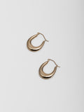 14kt Yellow Gold Dome Hammock Hoops pictured on light grey background.