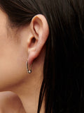 14kt Yellow Gold Pave Diamond Safety Pin Earring pictured in models ear.