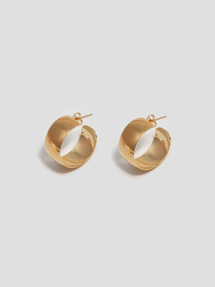 Vermeil Midi XL Dome Hoops pictured on light grey background. 