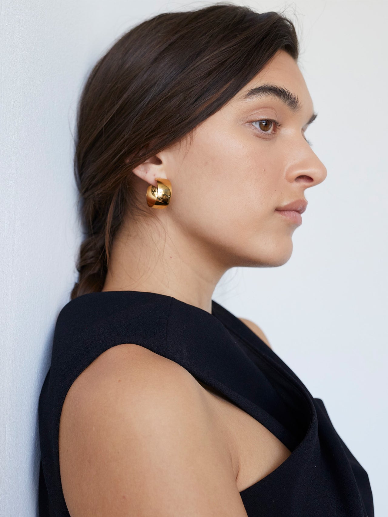 Vermeil Midi XL Dome Hoops pictured on model. White background. Side profile. 