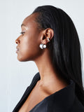 Sterling Silver Midi XL Dome Hoops pictured on model from side profile.