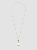 Gold necklace with a pendant on a light gray background