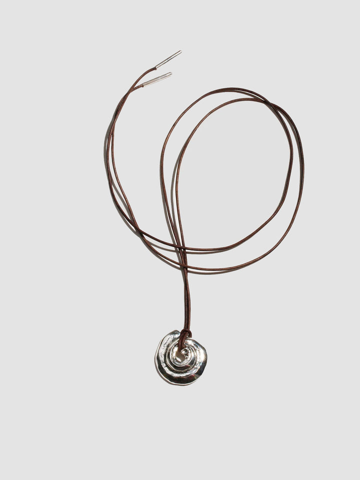 Necklace with a silver pendant on a white background