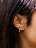Mini Diamond Safety Pin Earring pictured in models first piercing. 