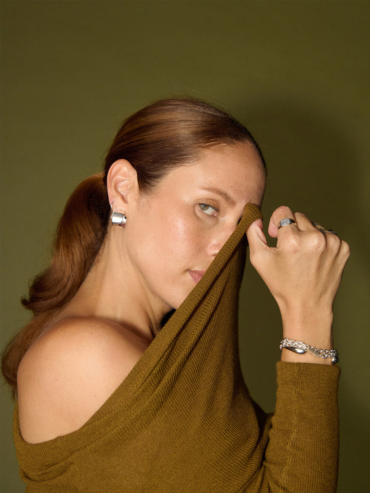 Sterling Silver Mini XL Dome Hoops pictured on model. 