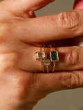 14Kt Yellow Gold Emerald Cut Bezel Ring pictured on models ring finger with other bands.