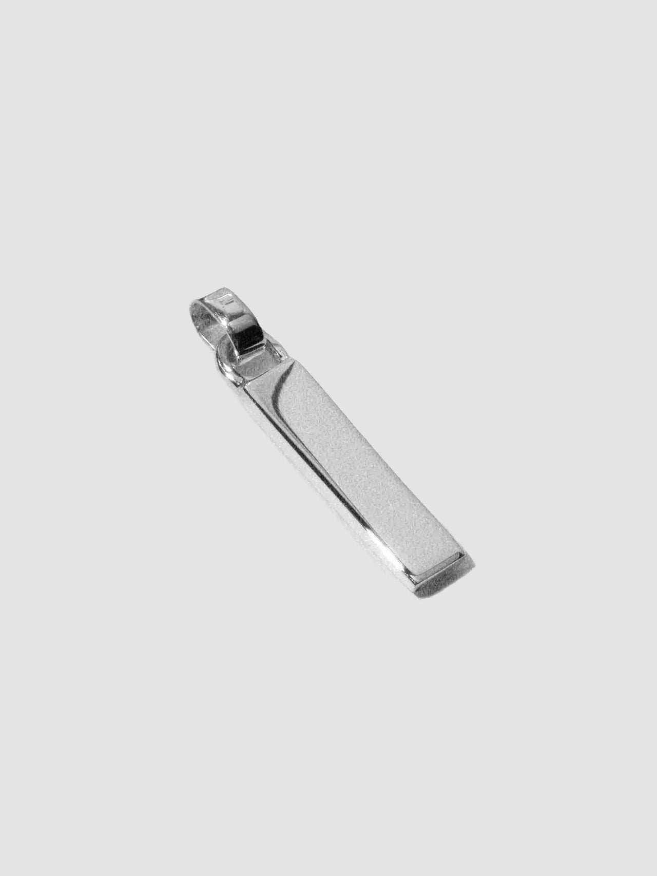 Zipper Pendant pictured on light grey background.