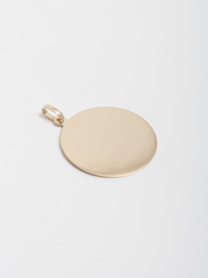 product image of yellow gold disk pendant