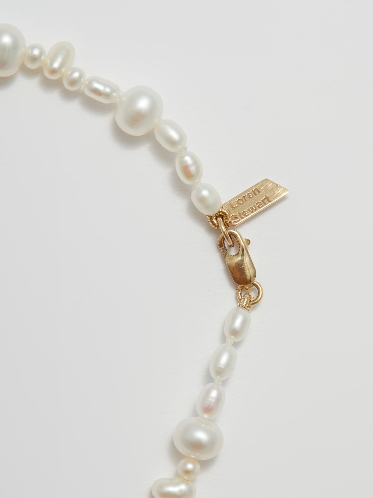 Close up of Gold clasp on Belisimo Pearl Strand