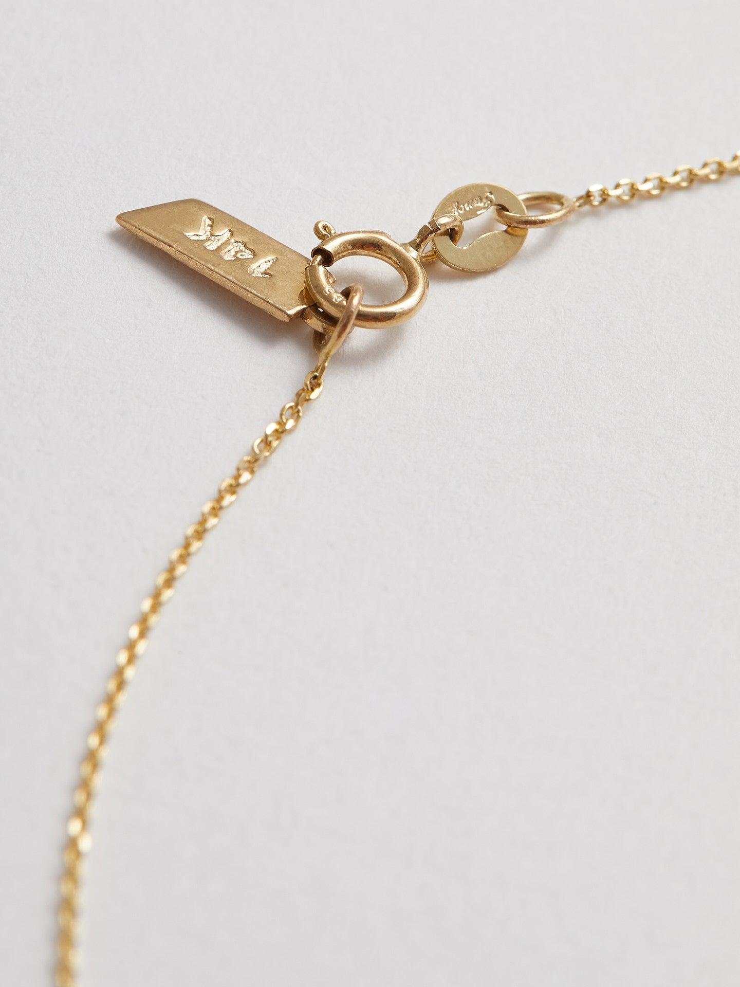 Close up of clasp on Jade Coin Necklace 