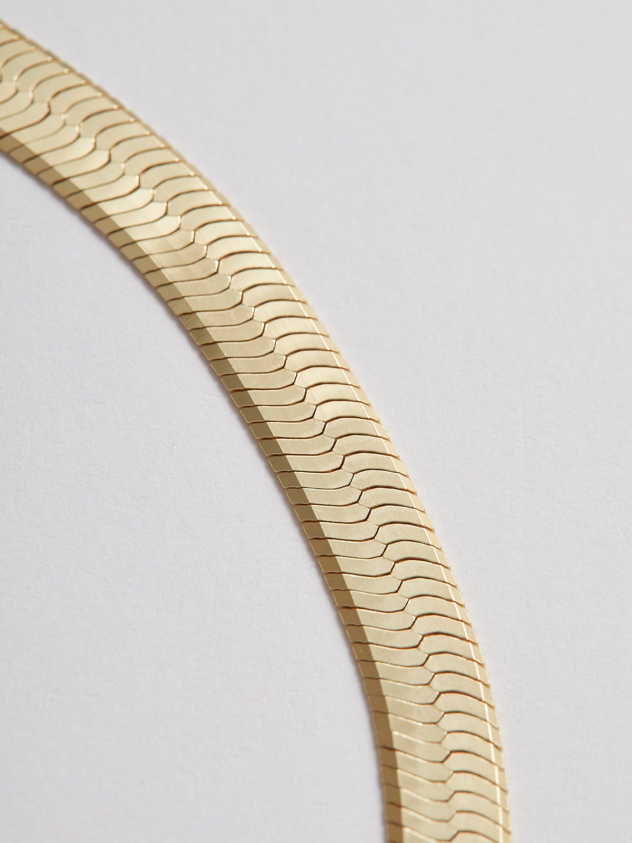 Close up of Chain on XL Herringbone Vermeil