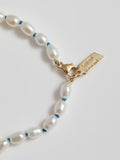 Close up of Freshwater Pearls with Blue String and 14k Clasp