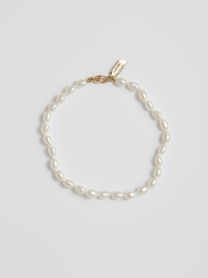 Rice Pearl Bracelet: 14kt Yellow Gold Freshwater Pearls Approx 3.5x5mm Pearls Length 7"