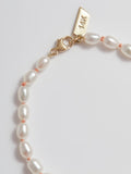 Close up of Freshwater Pearls and Pink String with 14k Clasp