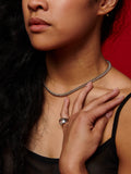 Sterling Silver Curb Chain pictured on model. Red background. 
