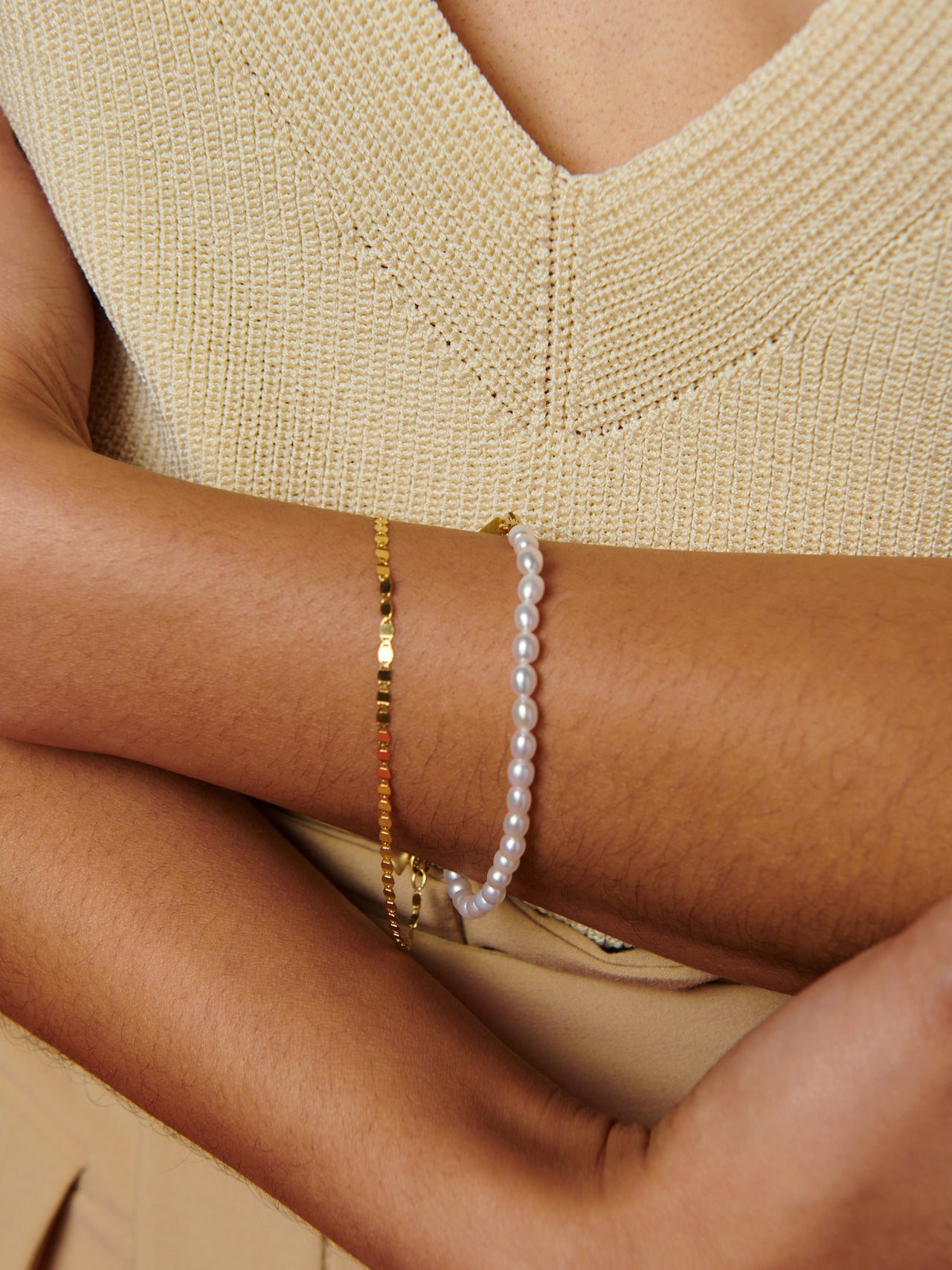 14kt Yellow Gold Freshwater Pearl Bracelet pictured on models wrist. 