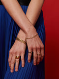 14Kt Yellow Gold Disco Chain Bracelet pictured on models wrist. 