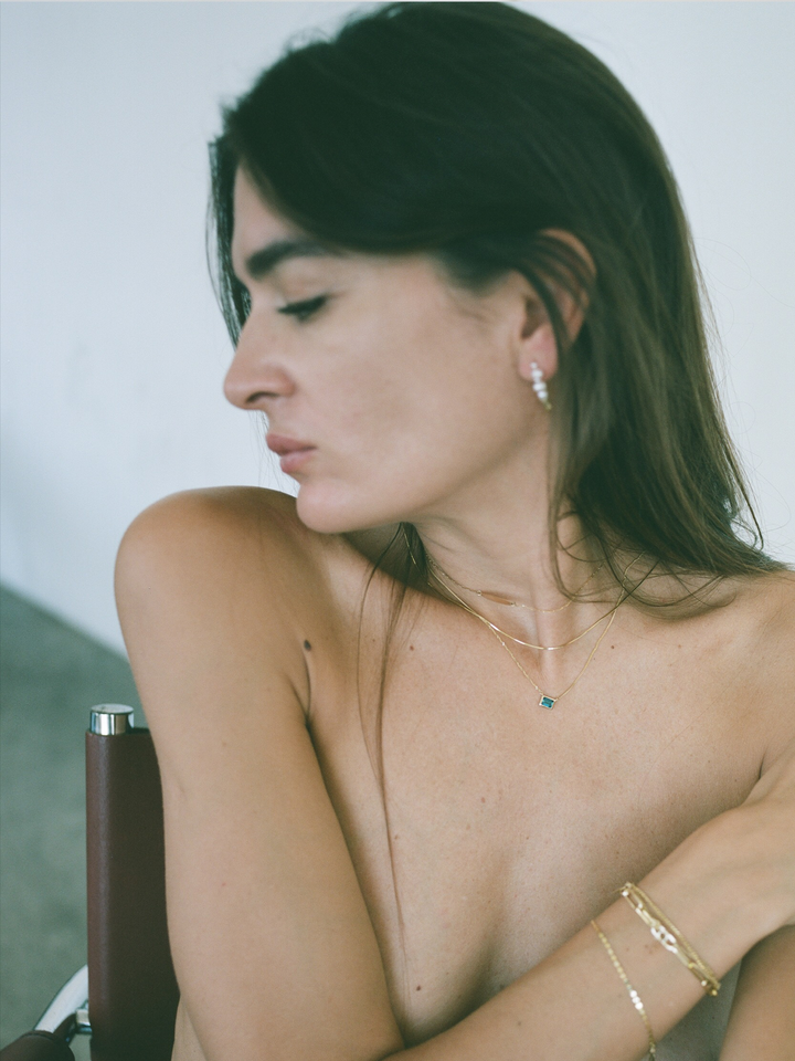 on model imagery of blue bezel cut necklace