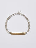Watts ID Bracelet: Sterling Silver Curb Chain with a 14Kt Gold ID Centerpiece Length: 7’ (adjustable)