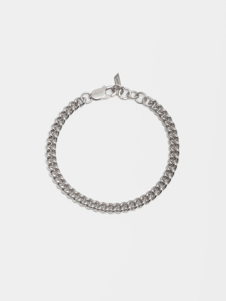 Product image of sterling silver petite industrial curb chain bracelet shot on white background.