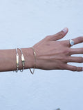 Mini Watts ID Bracelet pictured with the Mini Ellipse ID Bracelet on models wrist. 