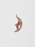 14Kt Rose Gold Moon Pendant pictured on light grey background. 