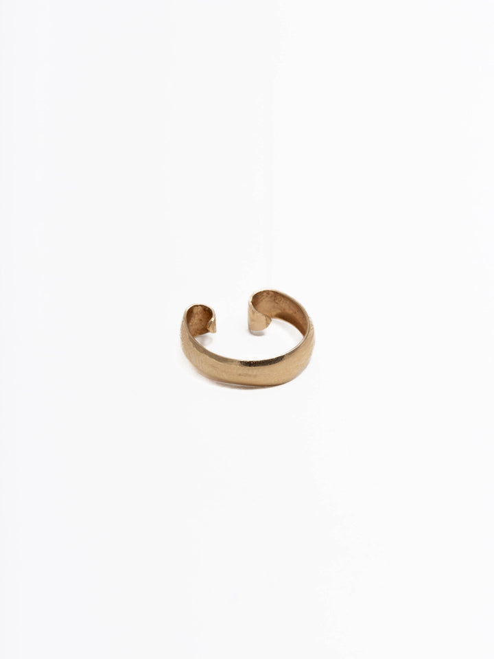 3mm Wide 14Kt Yellow Gold Ear Cuff pictured on light grey background.