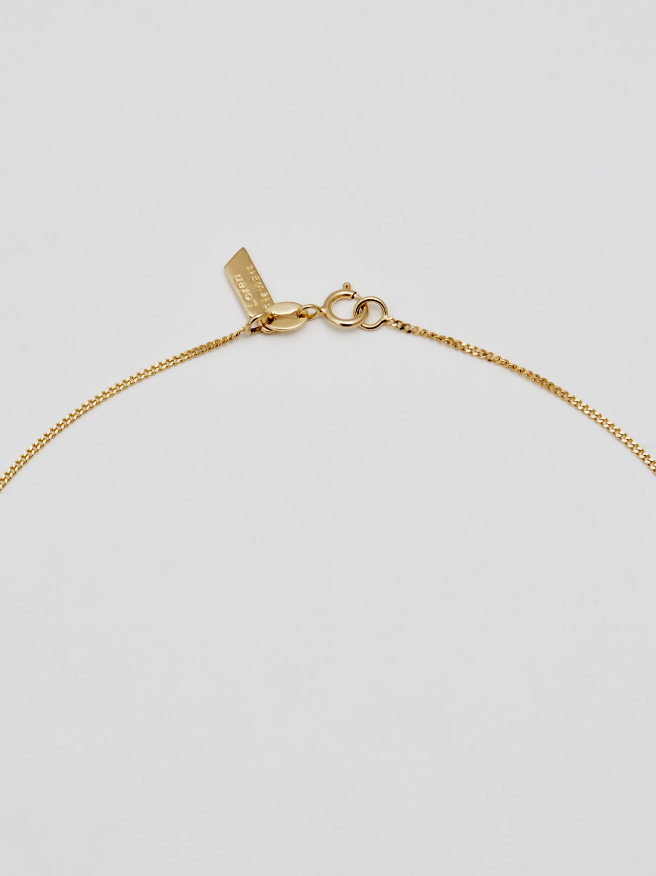 Close up of clasp  on Thin Curb Chain: 14Kt Yellow Gold Thin Curb Chain 