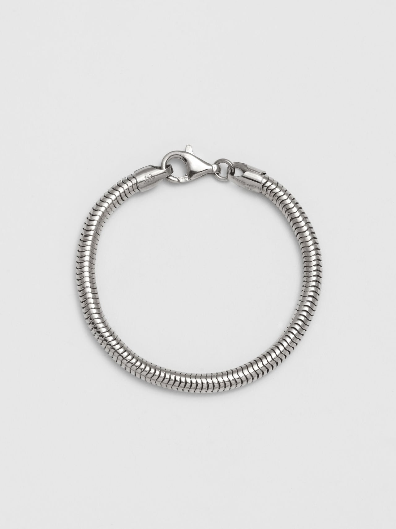 Zenith Bracelet: Sterling Silver Hollow Snake Chain Width: 4" Length: 7"