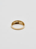Product shot of the back of Baby Dome Ring (shiny 14Kt Yellow Gold Dome Ring Tapered Width) with white background.