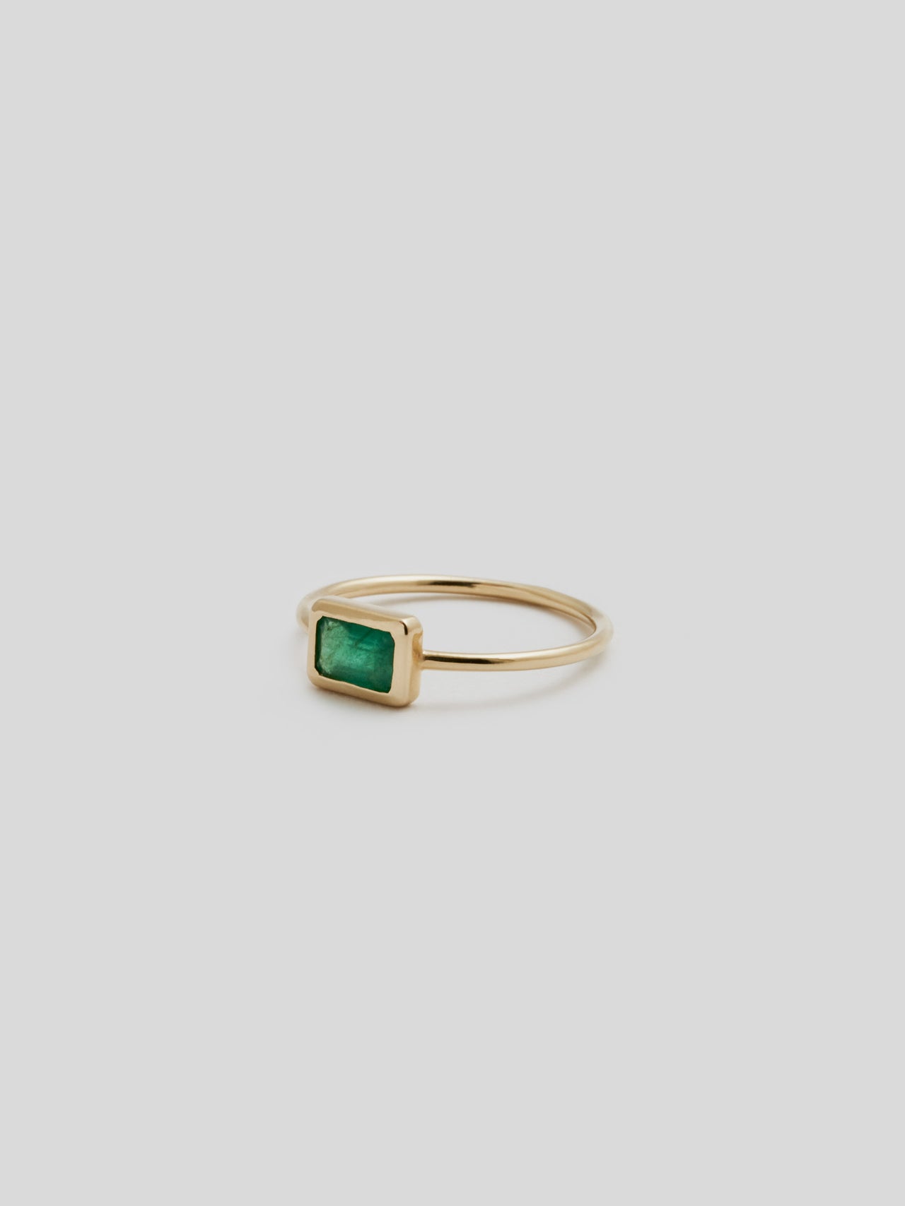 Side Shot of Emerald Cut Bezel Ring V.I: 14Kt Yellow Gold Bezel Ring with 4x6mm Emerald Cut Green Quartz