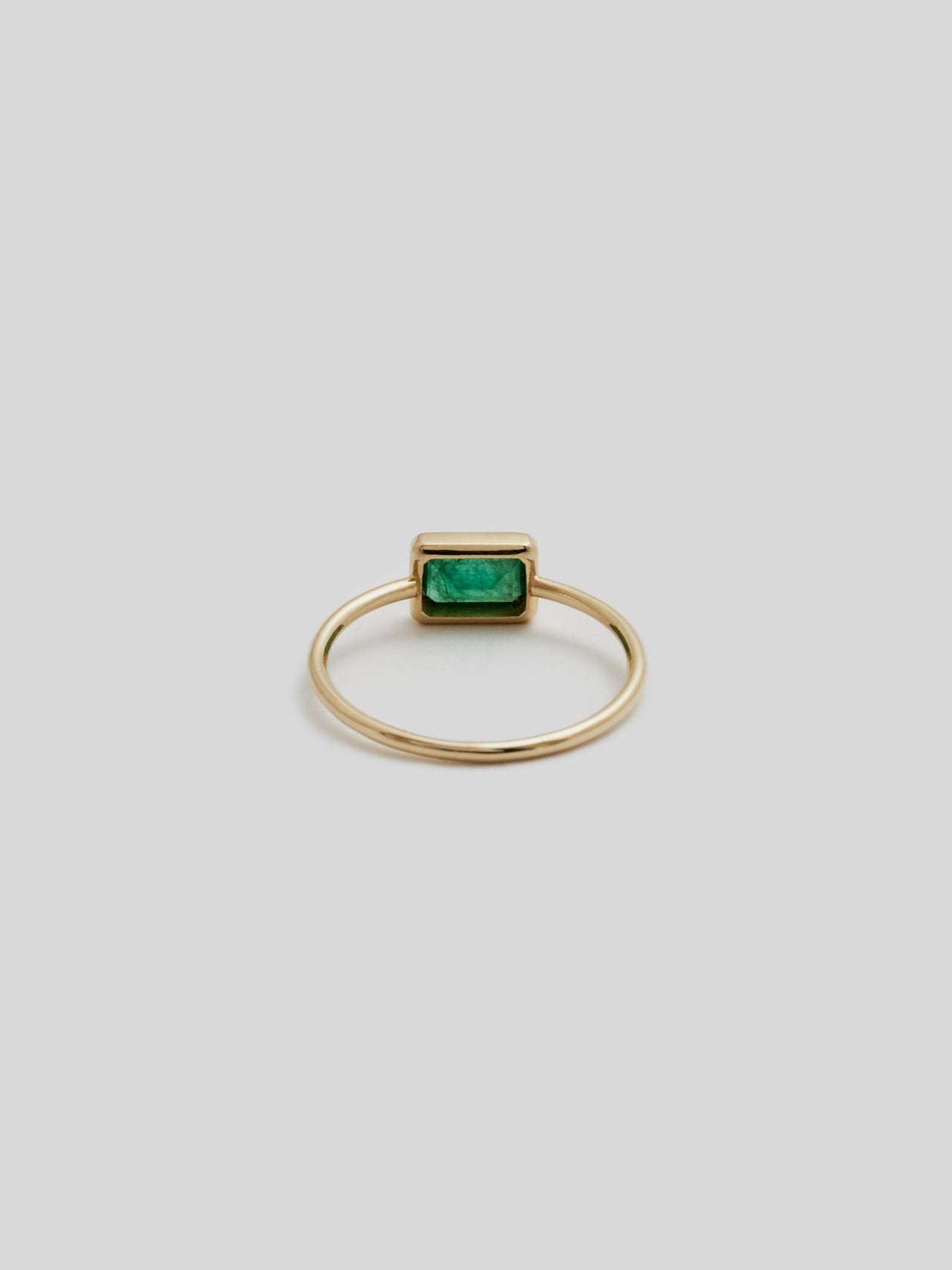 Back Shot of Emerald Cut Bezel Ring V.I: 14Kt Yellow Gold Bezel Ring with 4x6mm Emerald Cut Green Quartz